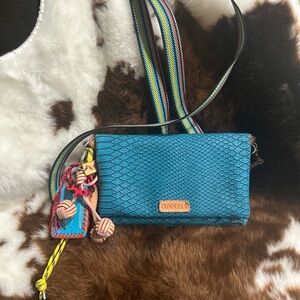 Consuela Teal Textured Crossbody Bag with Multicolor Strap